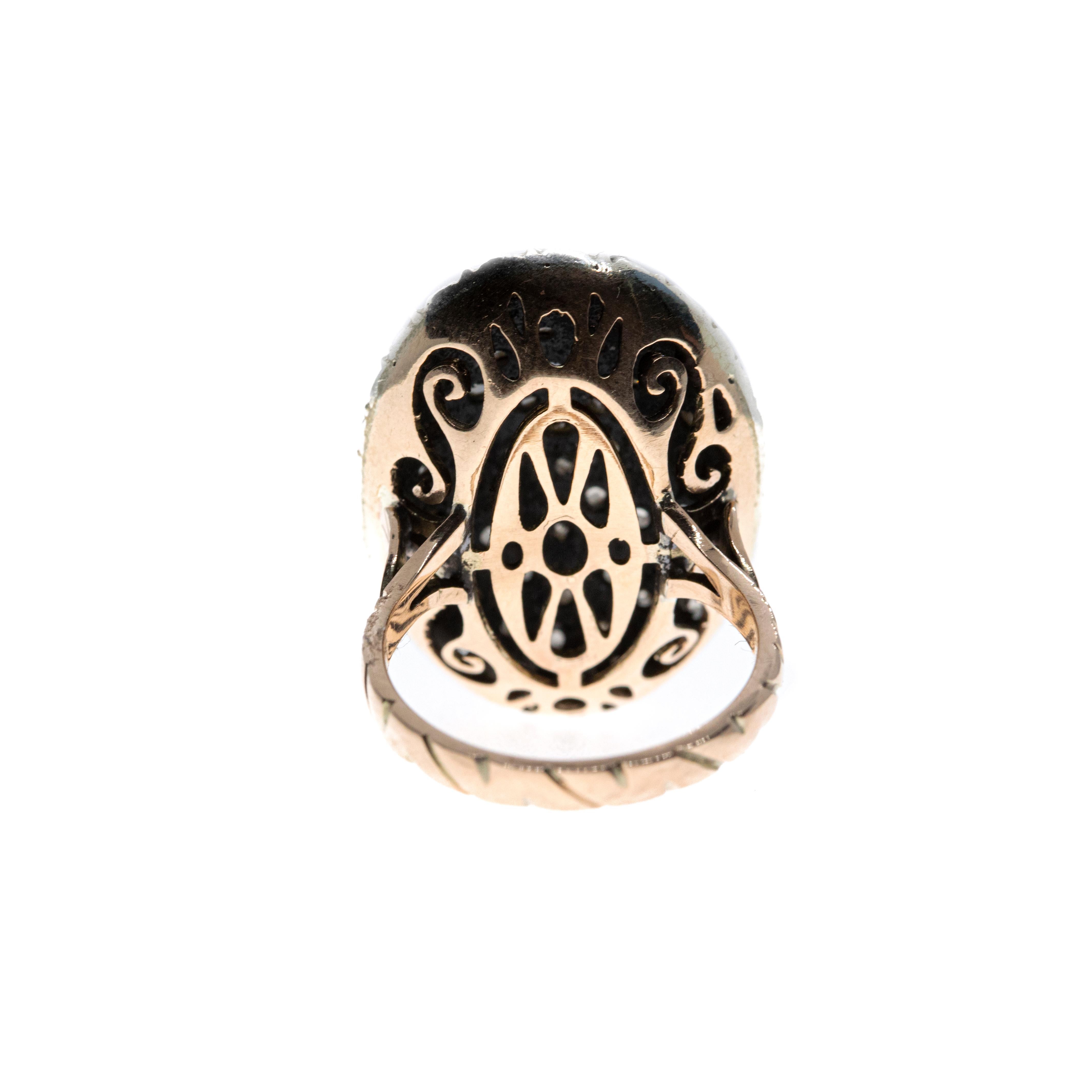 Understated and elegant, and yet 600-odd years in the making, this oval rose gold and blackened silver cocktail ring is produced using an ancient Albanian technique that was brought to Palermo in the fifteenth century. 

This ring contains 2.65