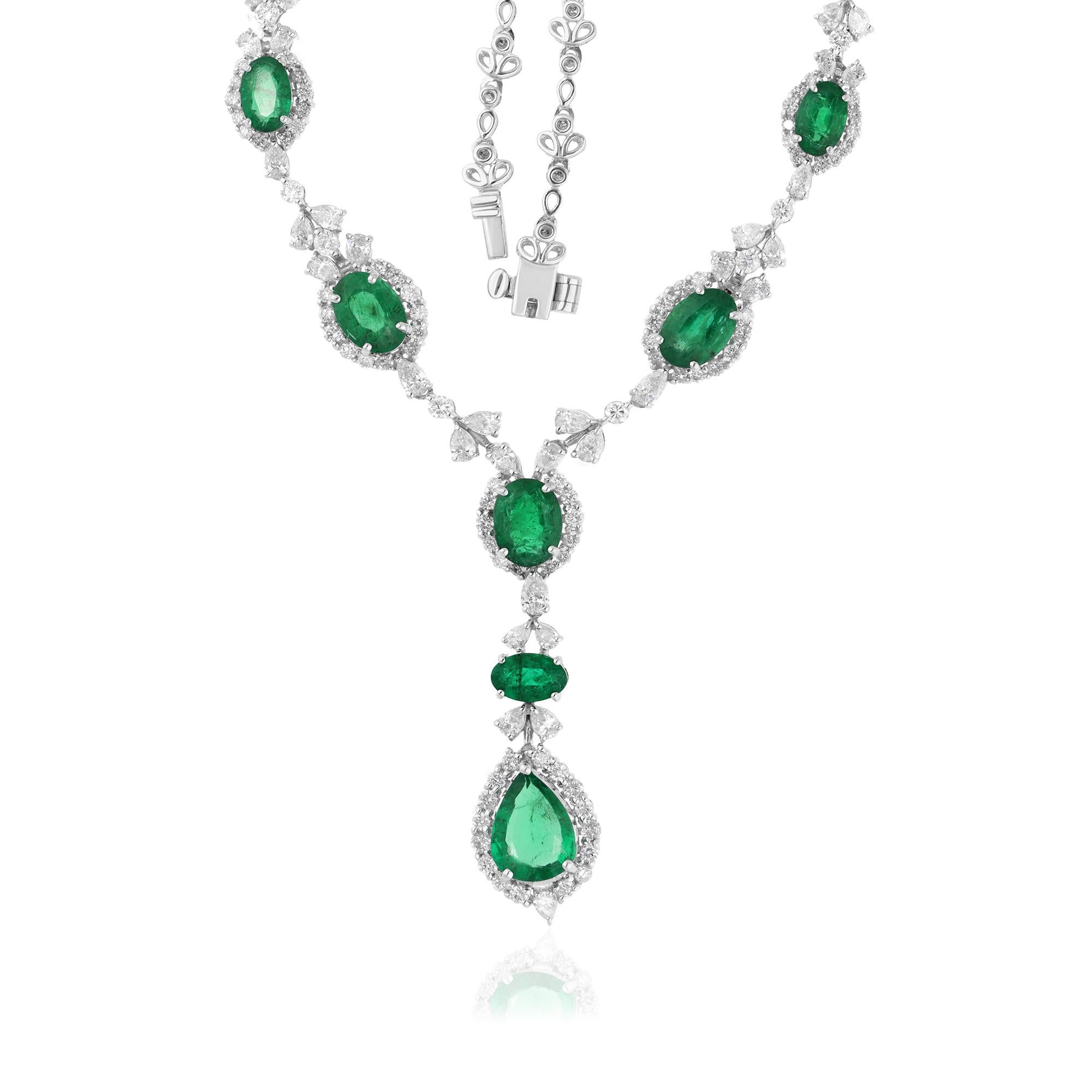 Elevate your style with the enchanting beauty of this Oval & Pear Shape Emerald Gemstone Necklace, adorned with sparkling diamonds and meticulously crafted in 14 karat white gold. Every aspect of this necklace exudes sophistication and refinement,