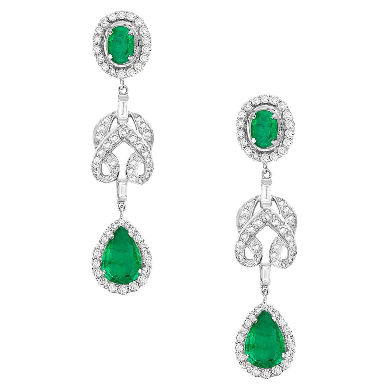 Oval & Pear Shaped Emerald Earrings in 18k Gold with Pave Diamond in Knot Shape For Sale