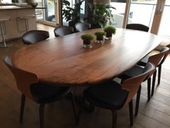 Oval 'Pebble Edged' Oak, Waxed Steel Legs by Jonathan Field.