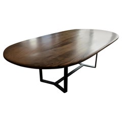 Oval 'Pebble Edged' Oak, Waxed Steel Legs by Jonathan Field.