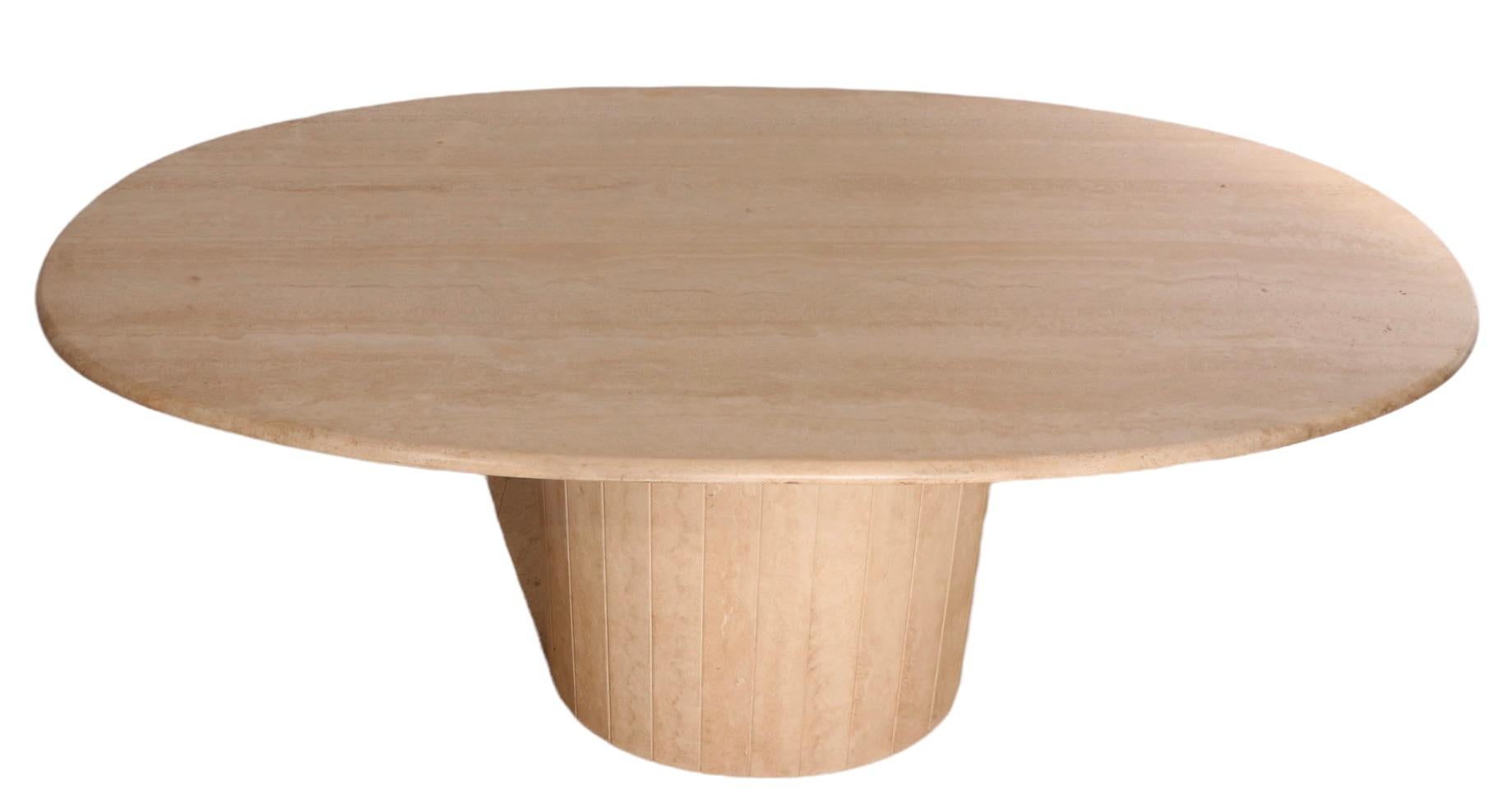 oval travertine dining table