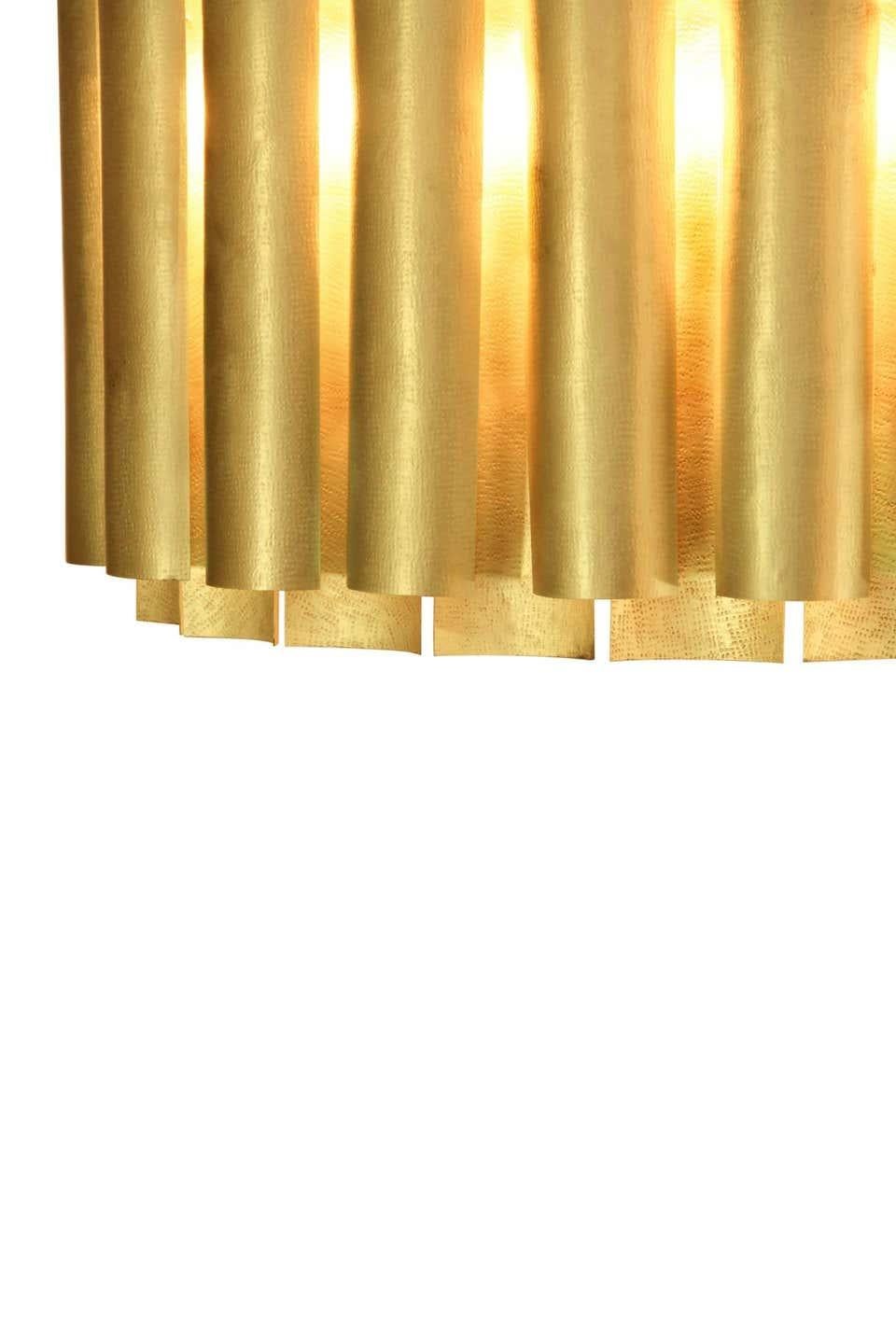 Matte hammered brass
Measures: Height 21.66 in. (55 cm)
Width 63 in. (160 cm)
Depth 35.44 in. (90 cm).