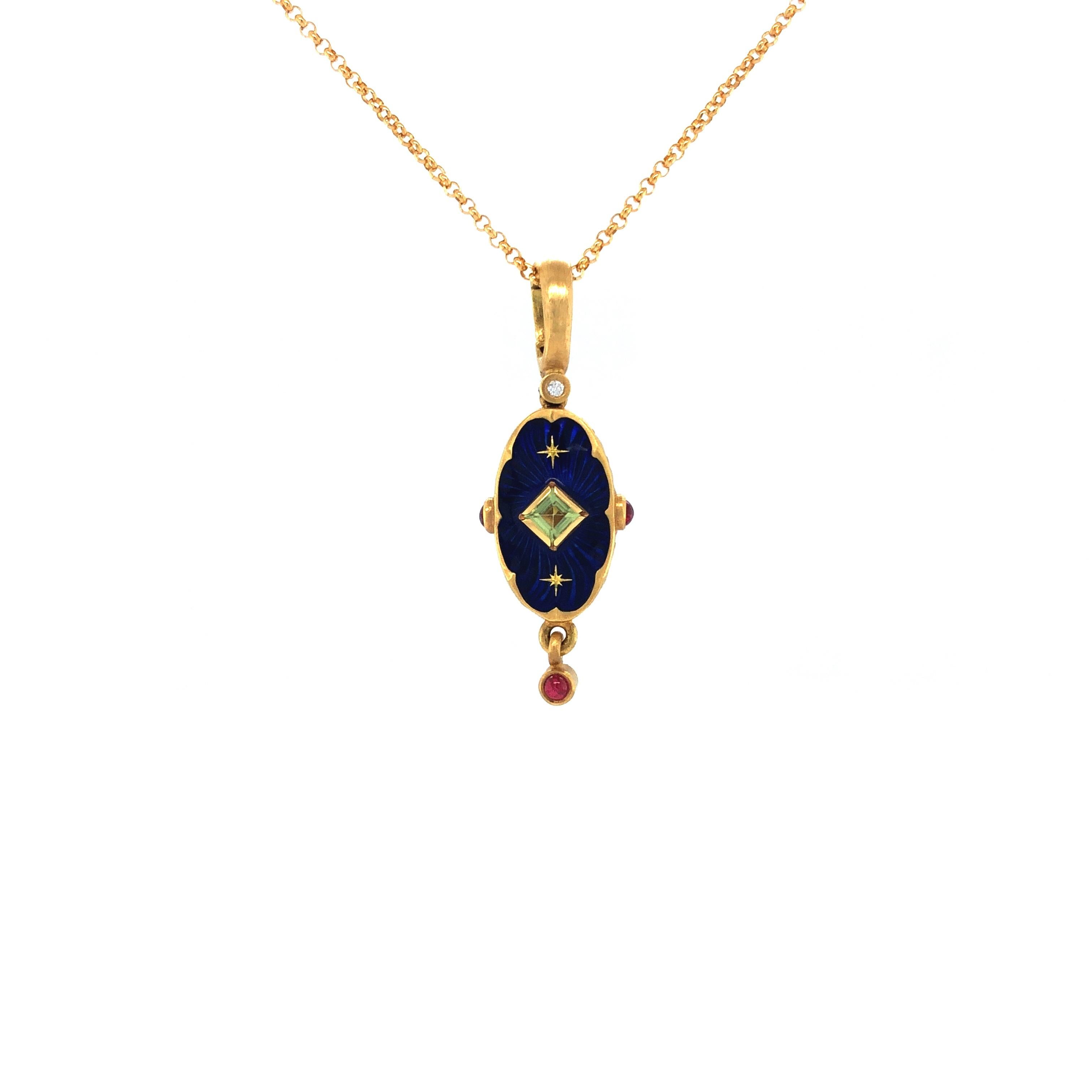 Victor Mayer oval pendant necklace 18k yellow gold, blue Guilloche vitreous enamel, 1 Peridot, 3 Rubies, 2 Gold Star Paillons 

About Victor Mayer 
Sensual, exotic, urbane and confident, Victor Mayer continues a 130 year tradition of classically