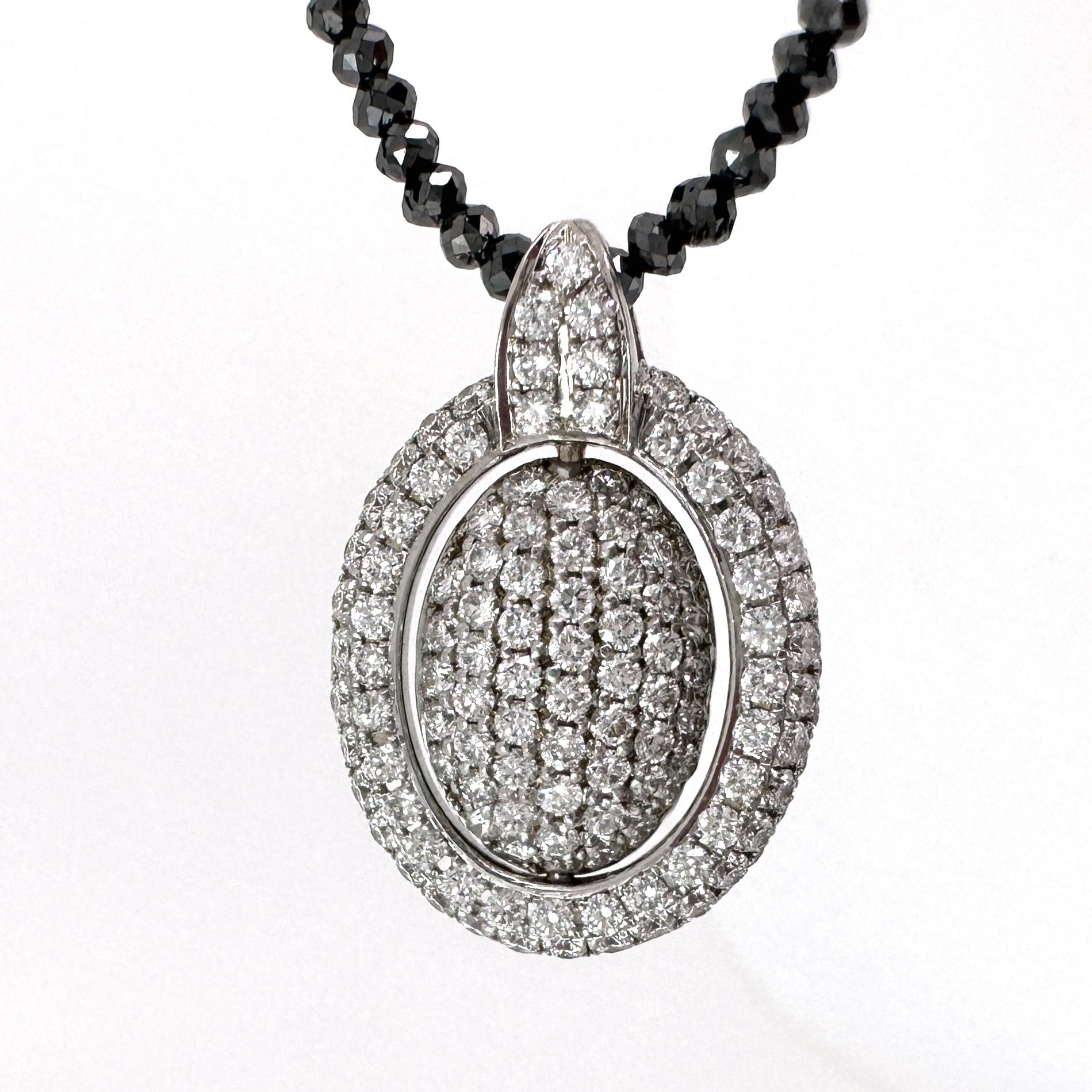 Oval Pendant with Reversible Black & White Diamond Center on Black Diamond Chain In New Condition For Sale In Sherman Oaks, CA