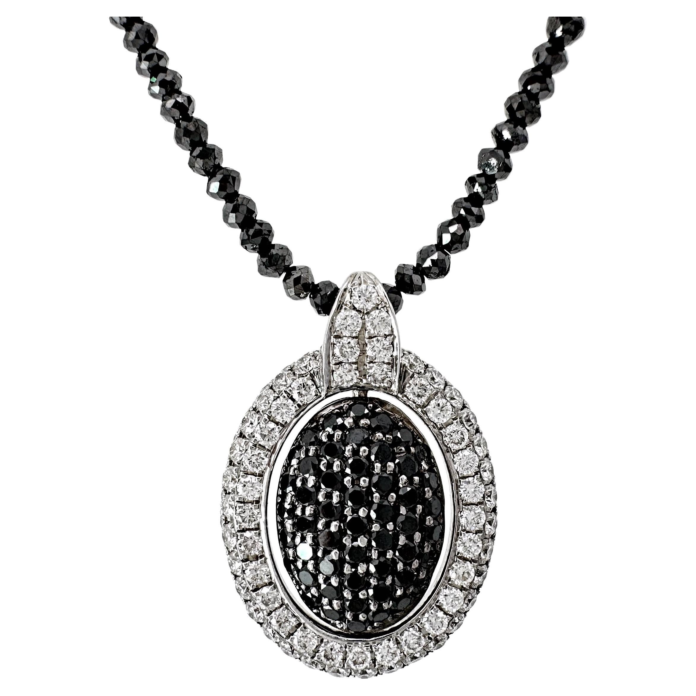 Oval Pendant with Reversible Black & White Diamond Center on Black Diamond Chain
