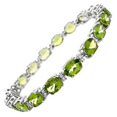 Oval Peridot 28.47 Ct & Natural Diamond Bracelet Prong Set in 14K White Gold