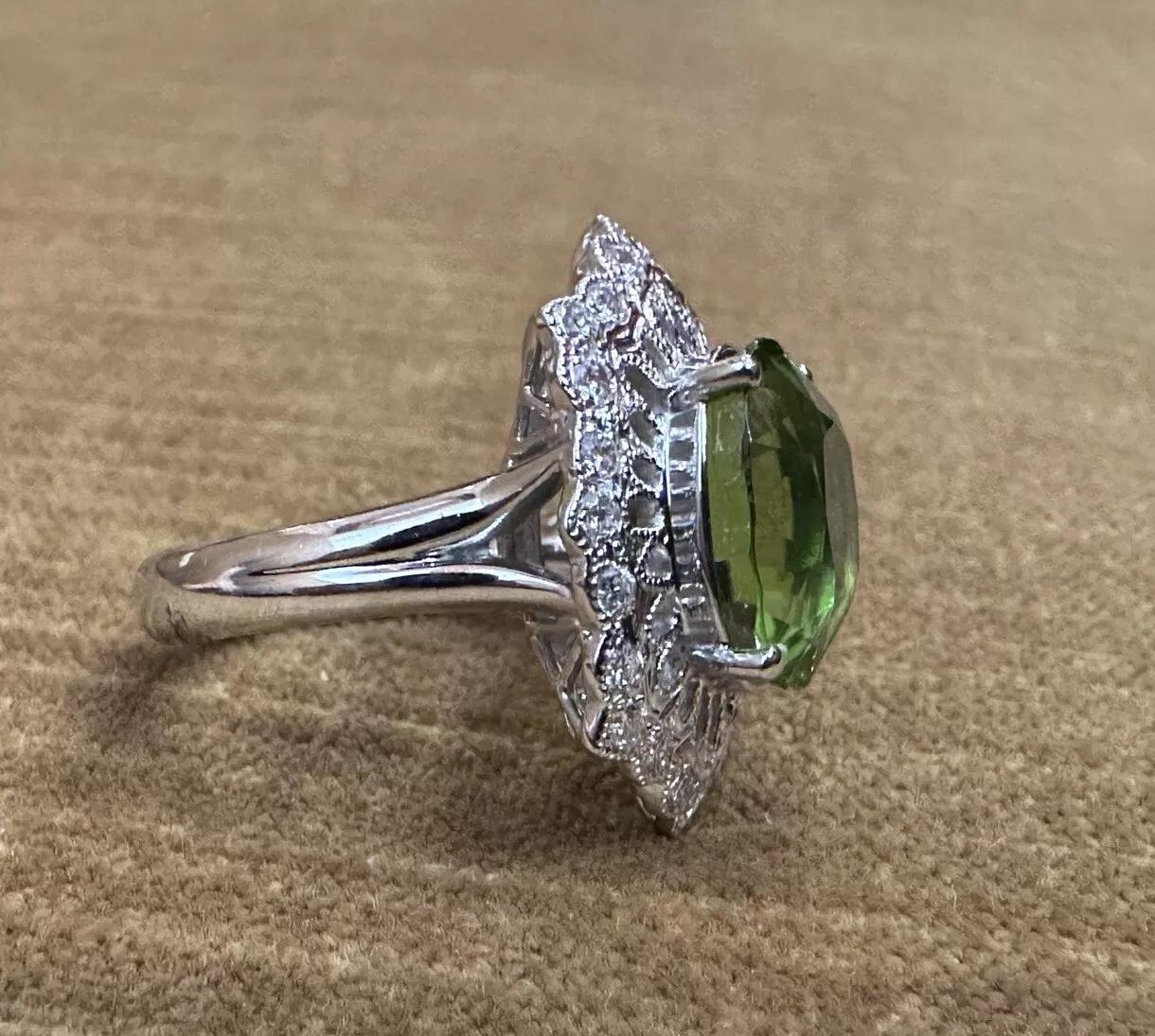 Oval Peridot 7.39 carat and Diamond Cocktail Ring in Platinum In Excellent Condition For Sale In La Jolla, CA
