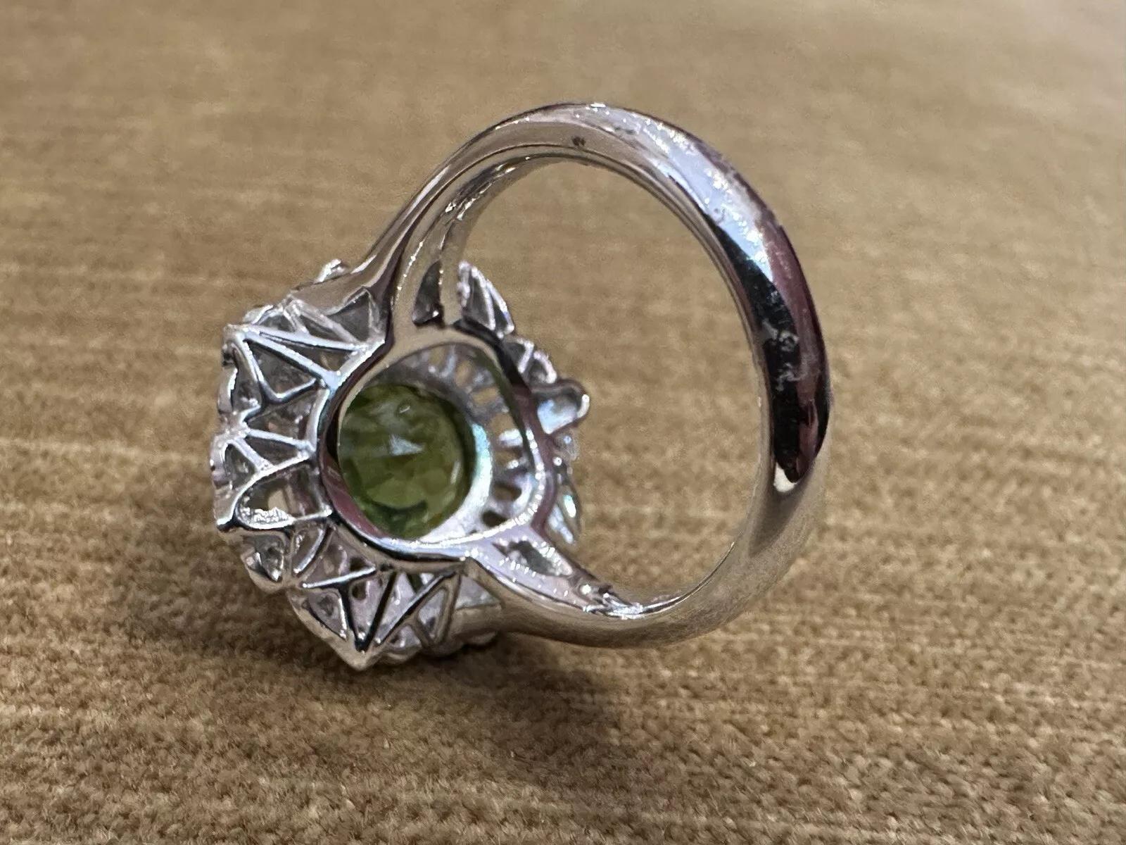 Oval Peridot 7.39 carat and Diamond Cocktail Ring in Platinum For Sale 1