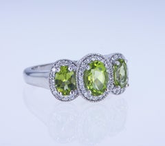 Oval Peridot and Diamond 3-Stone Ring