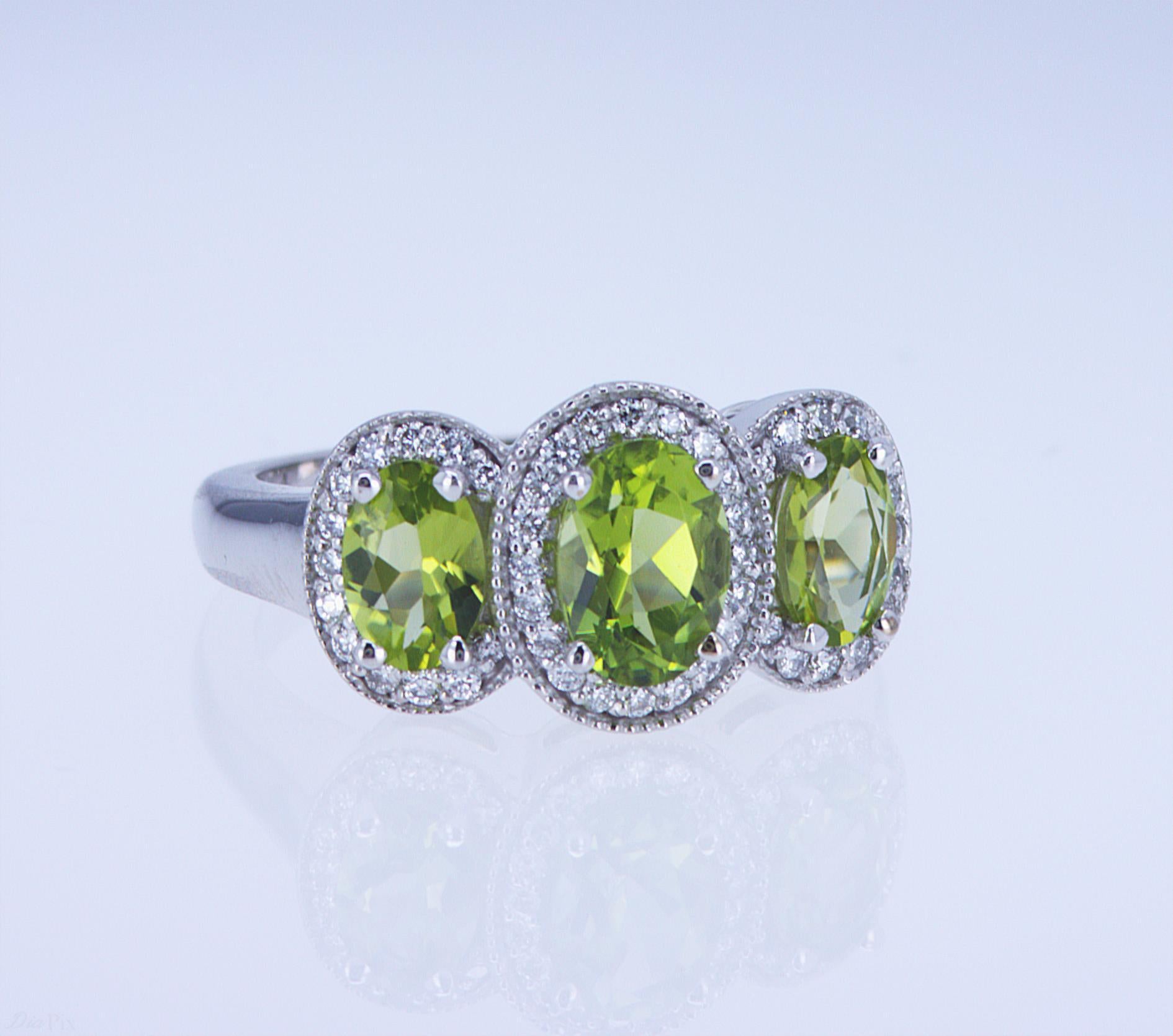For Sale:  Oval Peridot and Diamond 3-Stone Ring 3