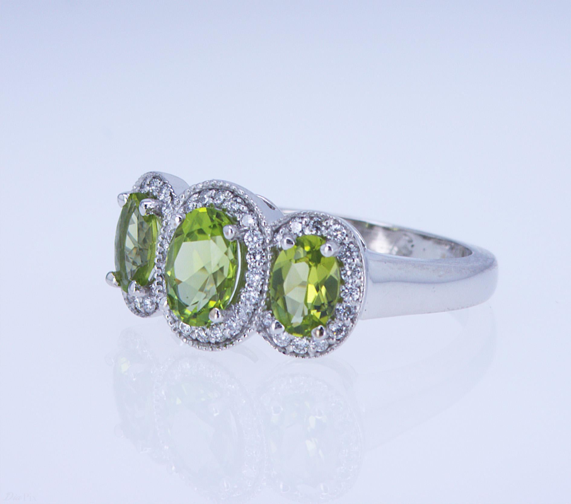 For Sale:  Oval Peridot and Diamond 3-Stone Ring 8