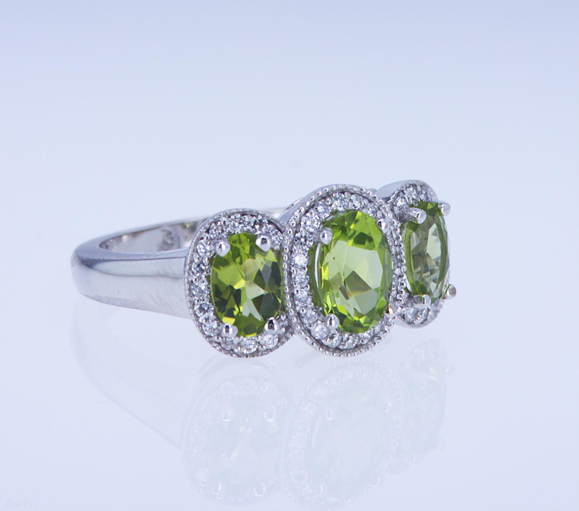 For Sale:  Oval Peridot and Diamond 3-Stone Ring 9