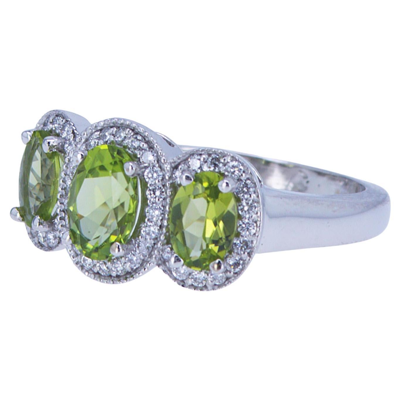 Oval Peridot and Diamond 3-Stone Ring