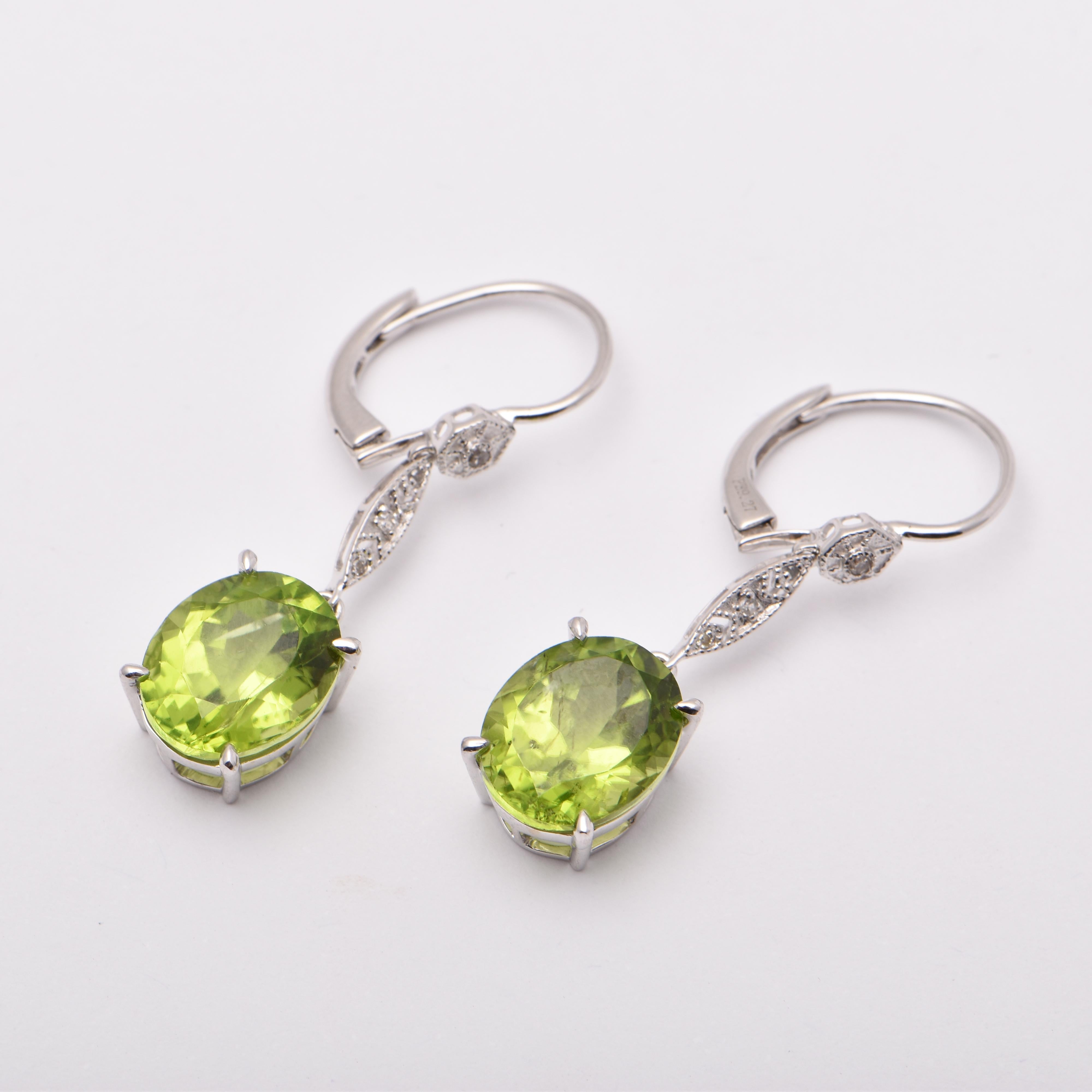 Oval Cut Oval Peridot and Diamond Drop Earrings in 18 Carat White Gold For Sale