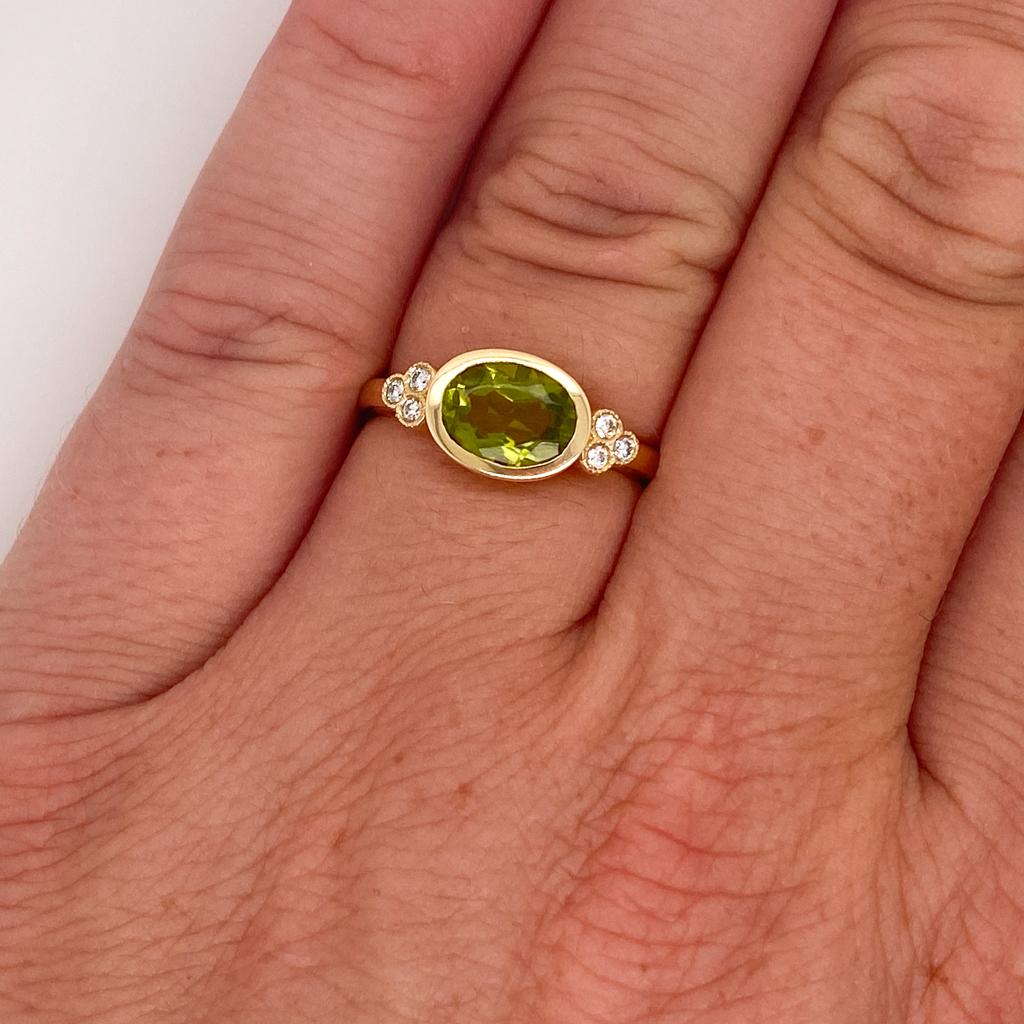 For Sale:  Oval Peridot Diamond Ring, 1.6 Carats in 14 Karat Yellow Gold, Bezel Modern Lv 2