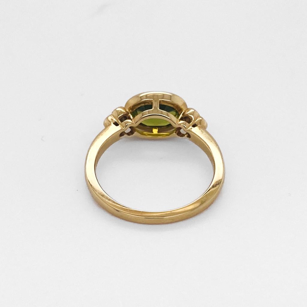 For Sale:  Oval Peridot Diamond Ring, 1.6 Carats in 14 Karat Yellow Gold, Bezel Modern Lv 6
