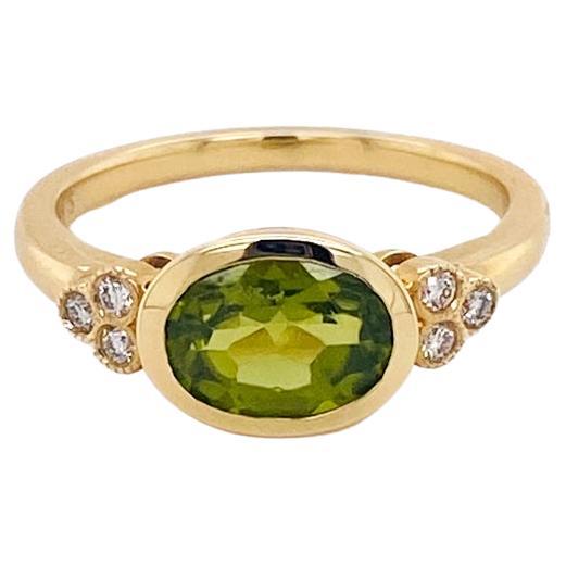 For Sale:  Oval Peridot Diamond Ring, 1.6 Carats in 14 Karat Yellow Gold, Bezel Modern Lv