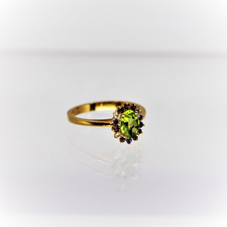 Oval Peridot Green Iolite blue and Diamonds Cluster Ring in 18 carat ...