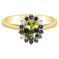 Oval Peridot Green Iolite blue and Diamonds Cluster Ring in 18 carat Yellow Gold