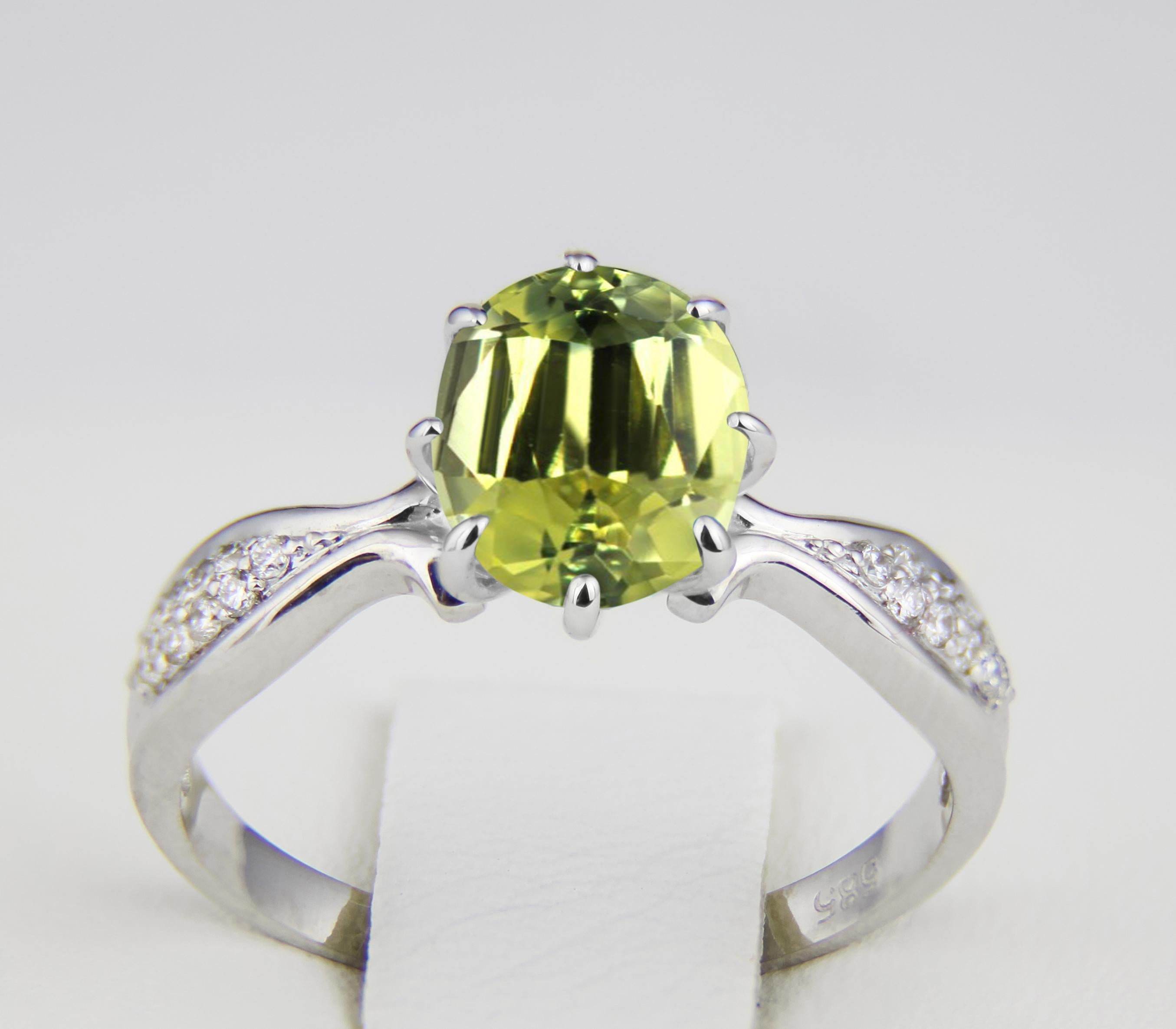 Modern Oval peridot ring.  For Sale