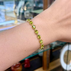 Bracelet tennis en péridot ovale, or jaune 14 carats