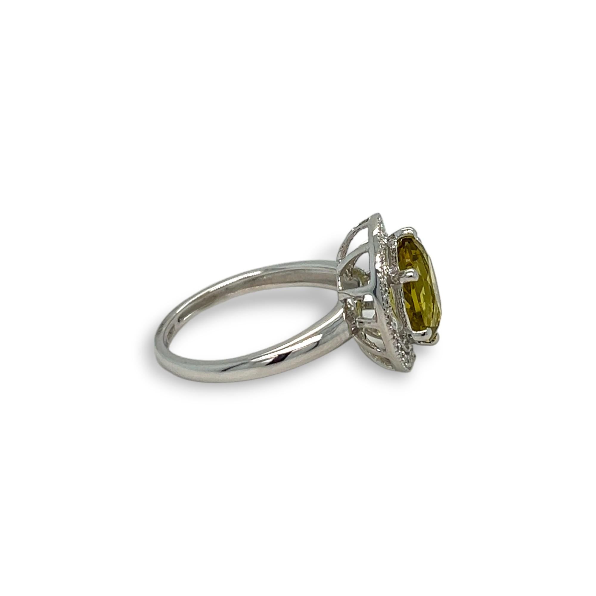 Oval Cut Oval Peridot with Diamond Halo White Gold Statement Ring For Sale