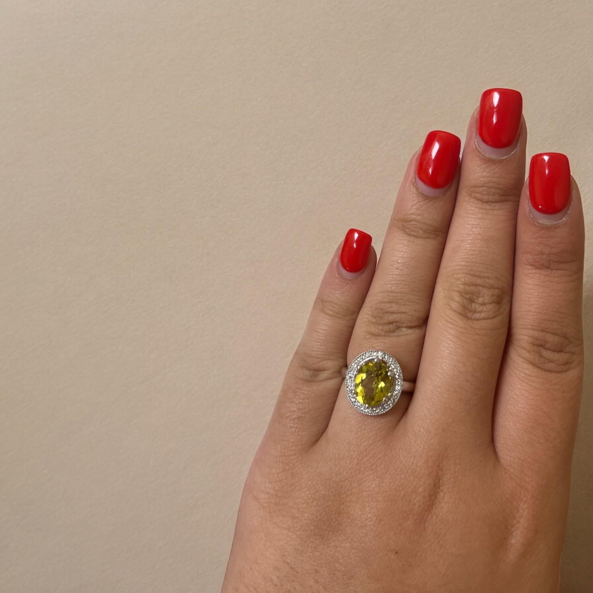 Women's or Men's Oval Peridot with Diamond Halo White Gold Statement Ring For Sale