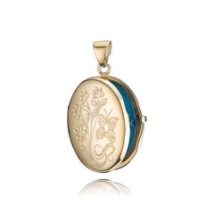 Oval Photo Locket – 14 Karat Gold – 17 x 25 mm – 3.8 g