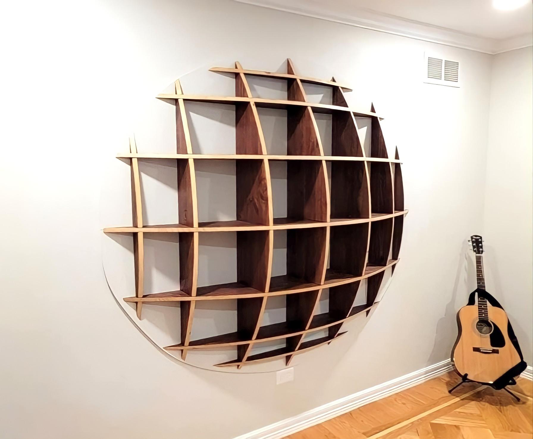 Oval pine shelves by David Renault
Dimensions: D 200 x H 170 cm
Materials: pine wood
Available in other wood shades and sizes.

Shelves made of solid pine from eco-responsible forests, because it is a fairly light but resistant for a piece of