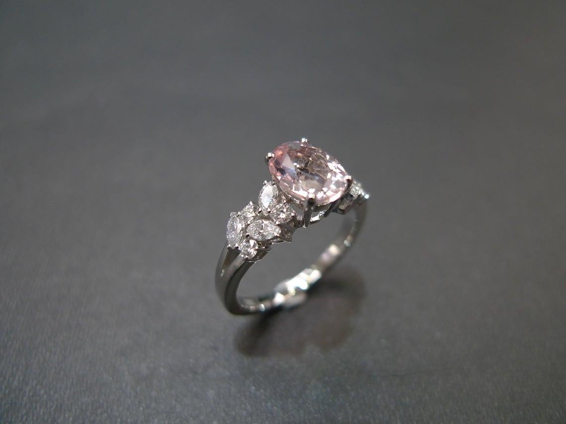 Modernist Oval Pink Morganite with Marquise Diamonds and Round Diamonds Engagement Ring For Sale
