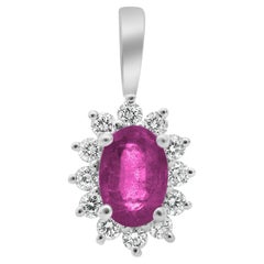 Oval Pink Sapphire, White Diamond, and 18 Karat White Gold Halo Pendant