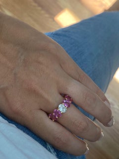 13.36 Carat Oval Pink Sapphire and Diamond Eternity Band Ring