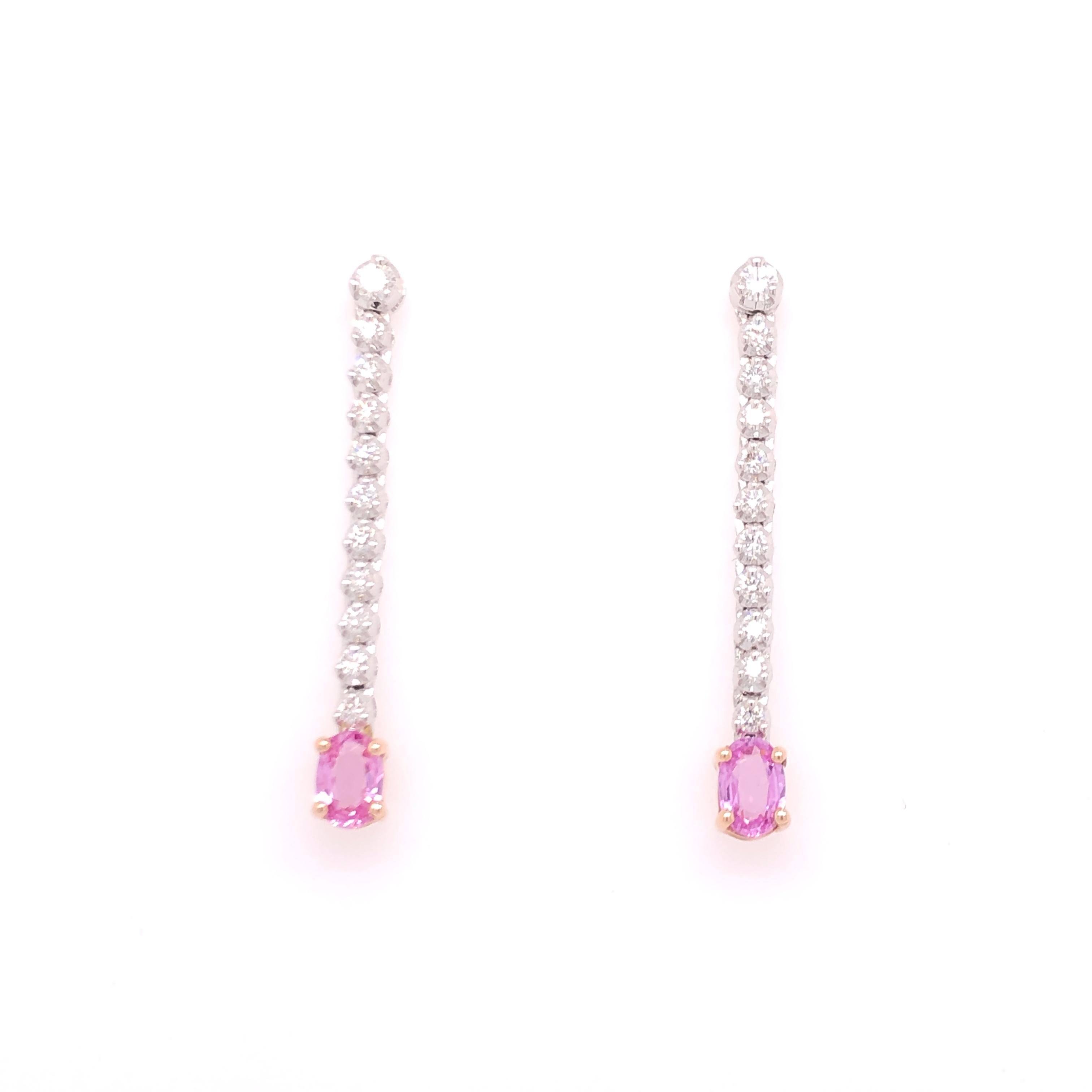 Light and refreshing, these pink sapphire and diamond earrings are the perfect finishing touch for spring time. The diamonds are set in 14K white gold to give them a brighter and lighter appearance, and the pink sapphires are set in 14K rose gold to