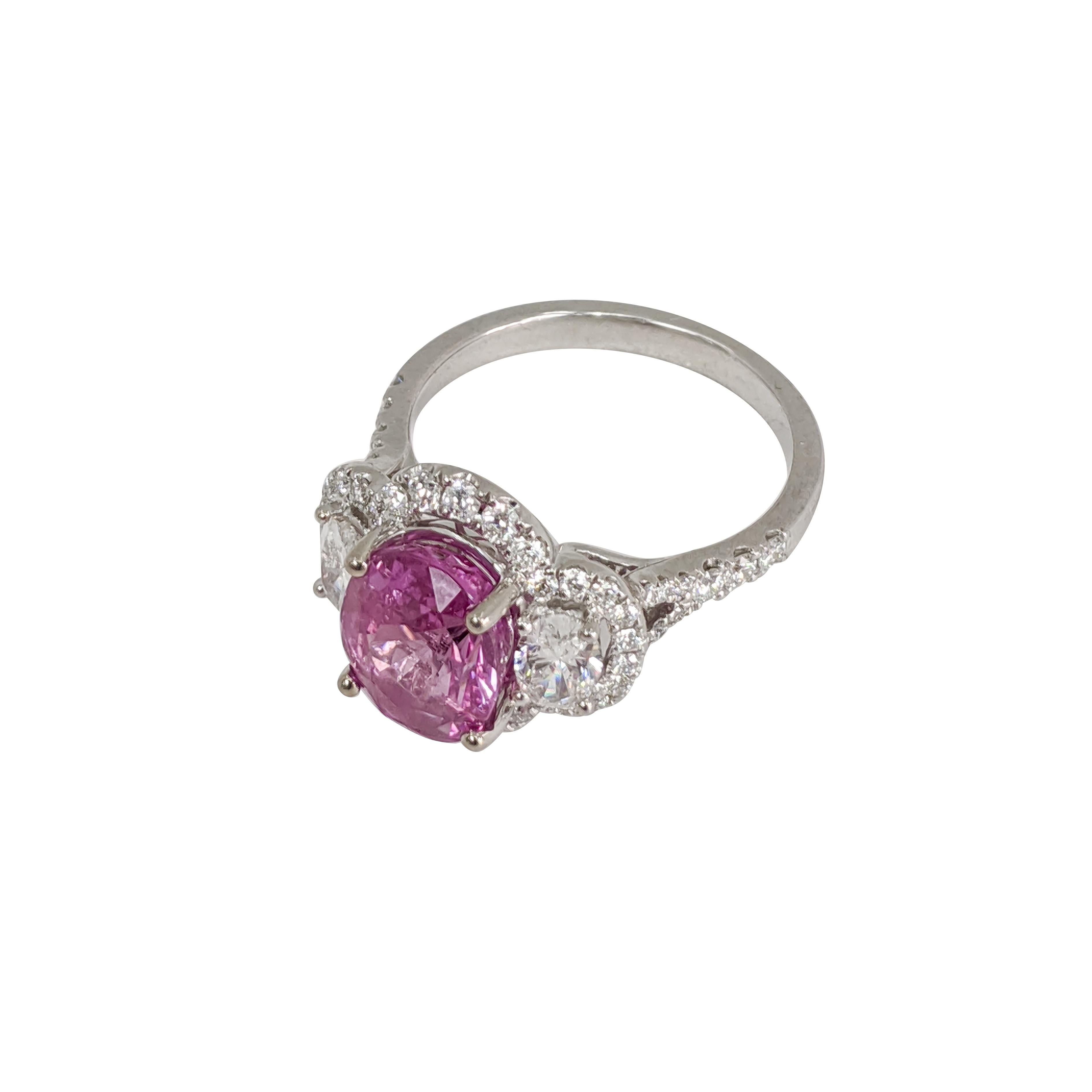 1 Pink Sapphire (Oval) 4.05ct
2 Diamonds (Oval) 1.18ct
Platinum Ring
3 Stone