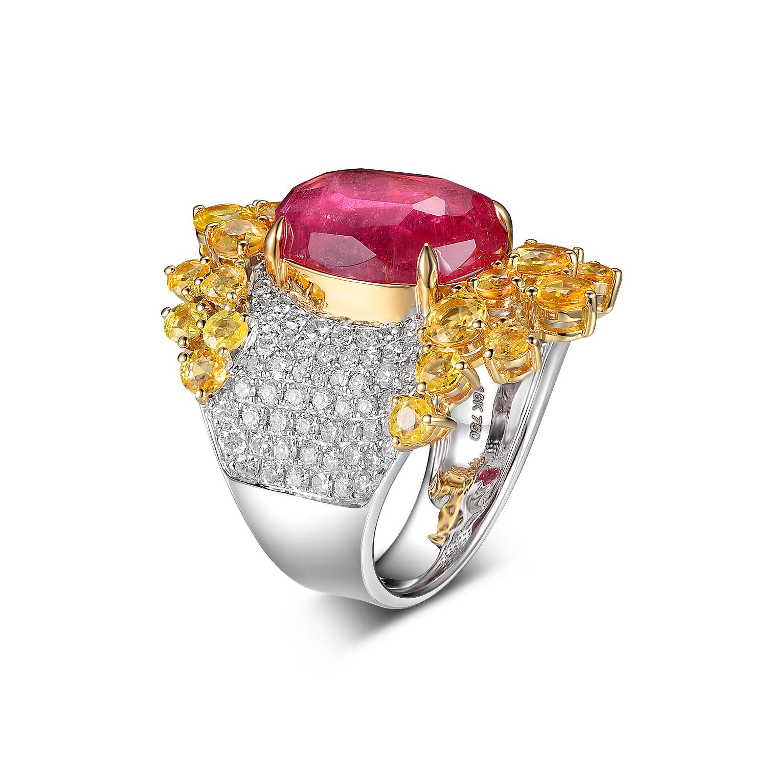 This ring features 4.92 carat of oval pink tourmaline assented with 2.87 carat of rose cut yellow sapphire and 1.13 carat of white round brilliance diamond. Retro cool yet timeless. 
Size 6.5
Complimentary sizing as needed

Pink tourmaline 4.92