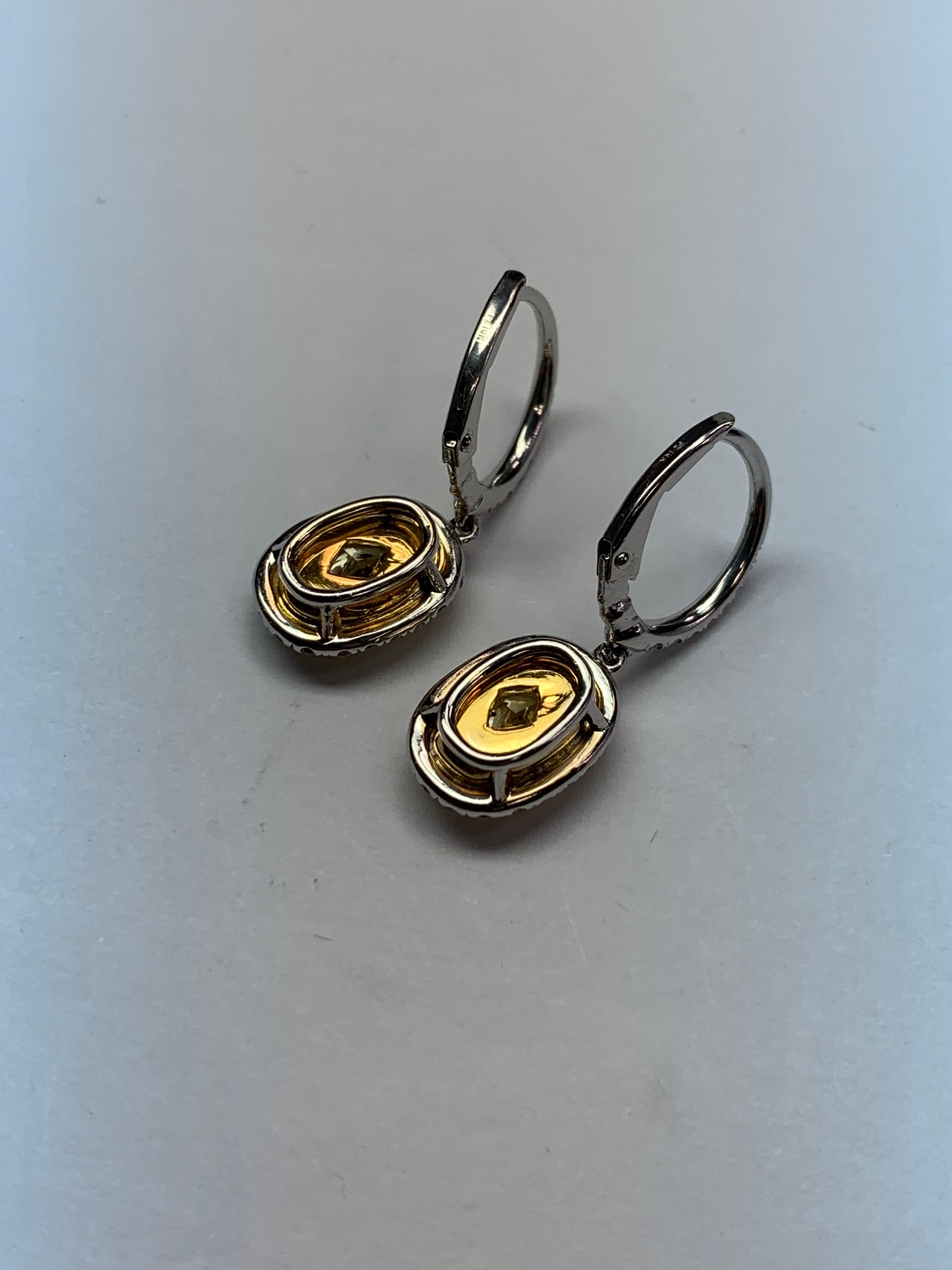 Modern 3.09 Carat Platinum GIA Certified Natural Intense Yellow Diamond Earrings For Sale 2