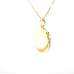 Oval Polished Locket Pendant, 18k Yellow Gold, Two Pictures