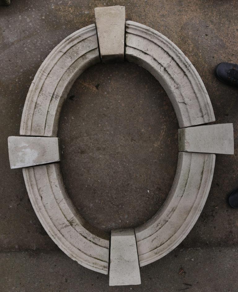 A reclaimed oval window carved from Portland limestone. We currently have four of these windows available.

Additional Dimensions:

Height 12- 18 cm

Internal 90 x 60 cm