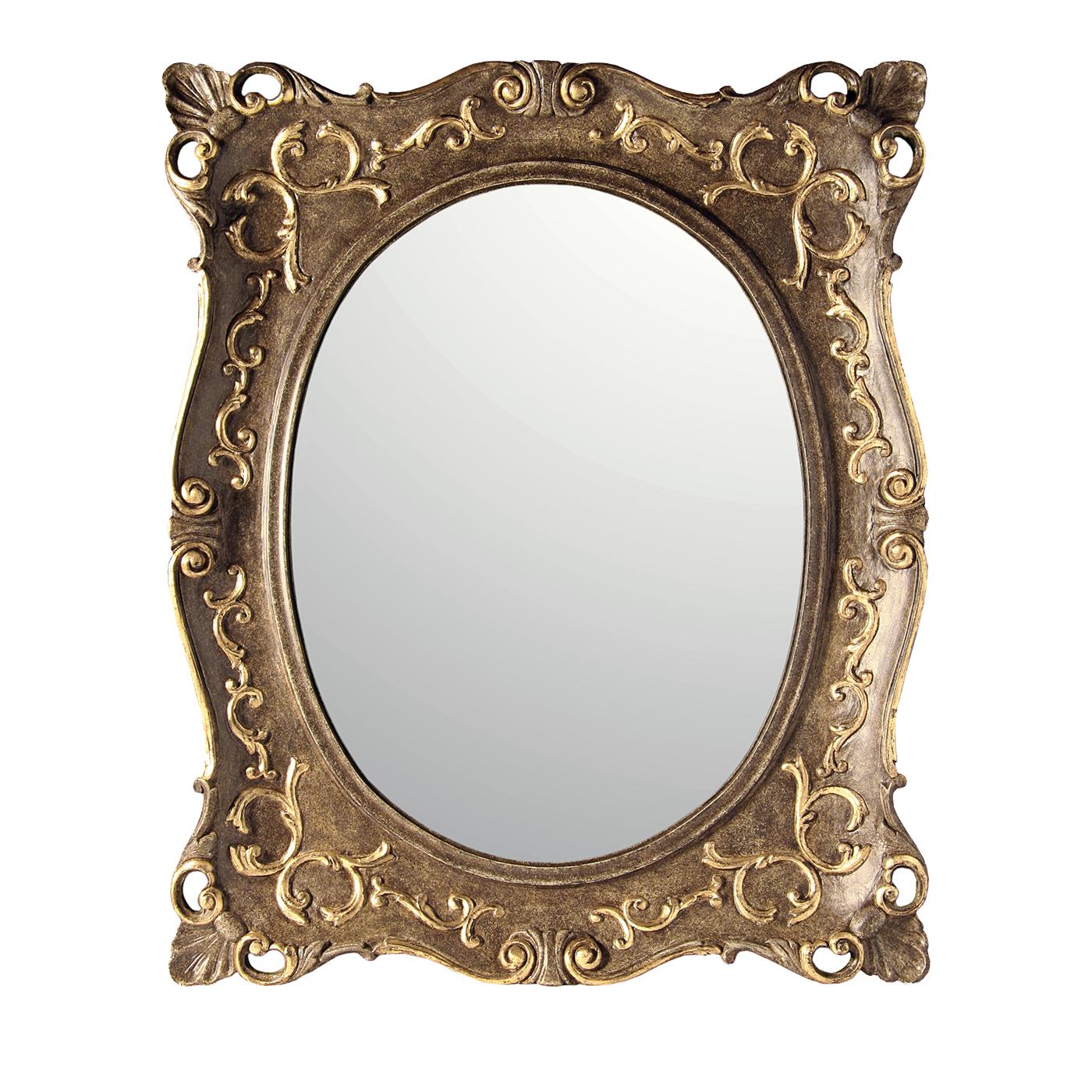 An exquisite addition to a Classic decor, this oval mirror is enclosed in a rectangular frame with gentle curves. Adorned with hand carved decorations both around its profile and on the front. The solid wood of the frame is coated with precious gold