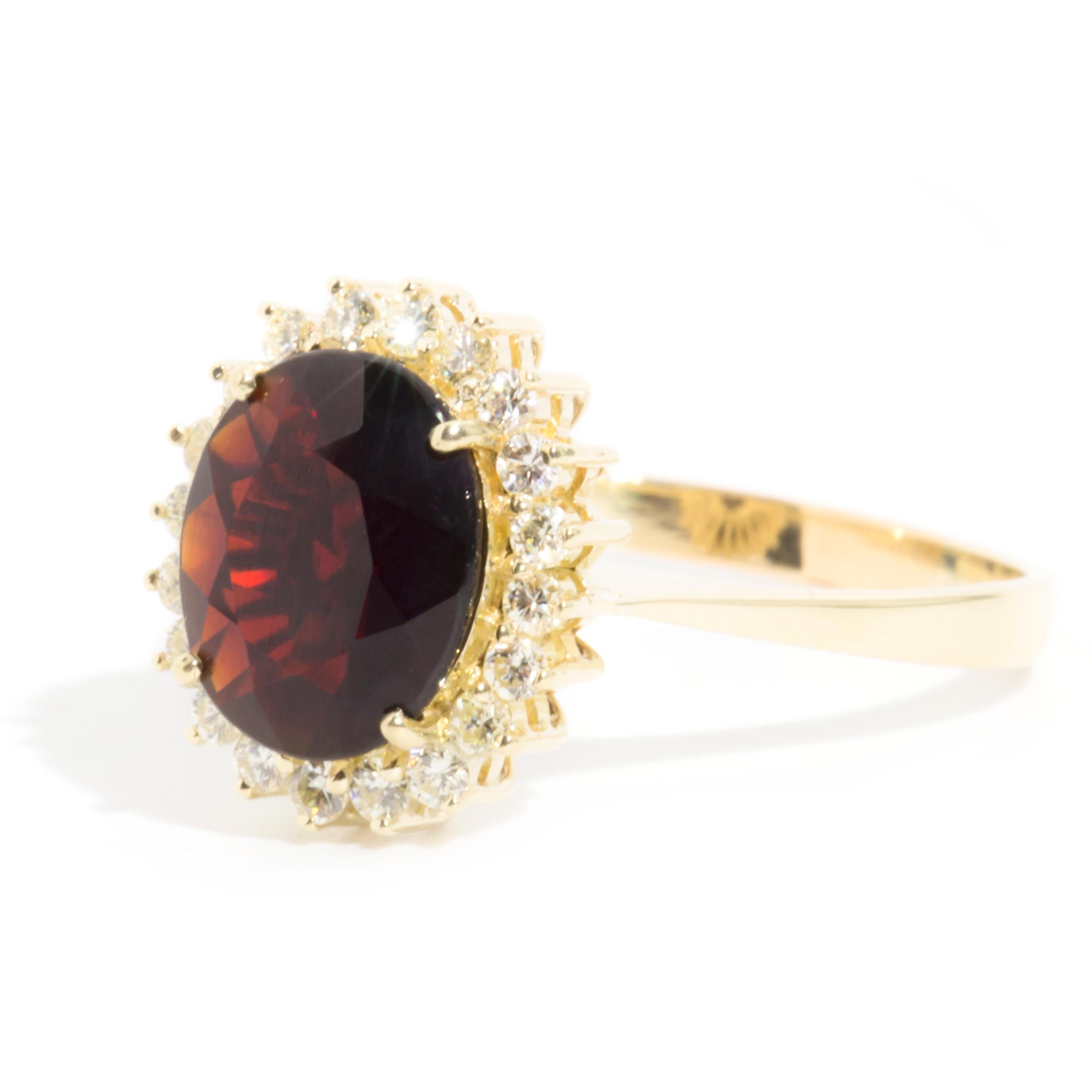 Modern Oval Red Garnet and Diamond Vintage Halo Cluster Ring in 14 Carat Yellow Gold