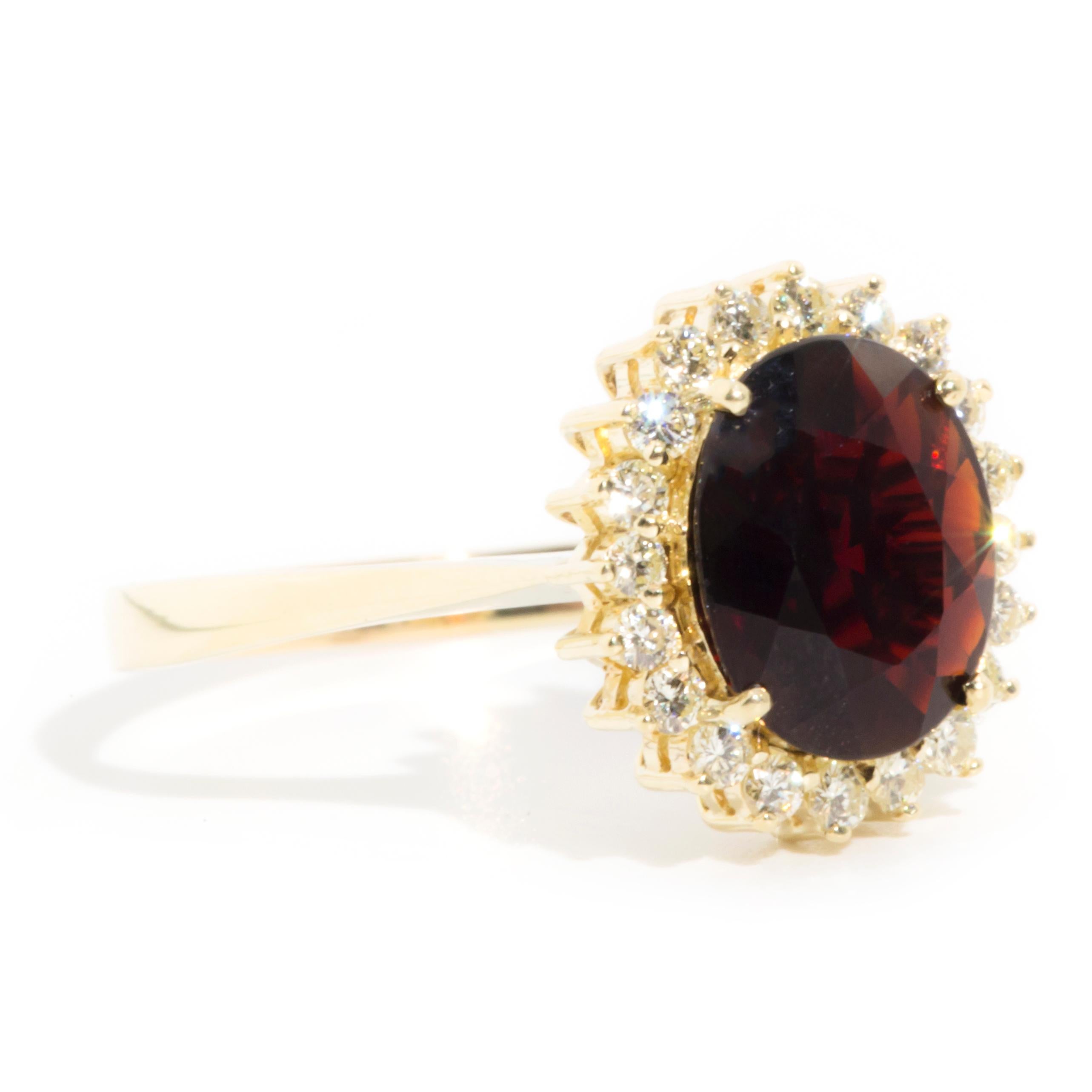 Women's Oval Red Garnet and Diamond Vintage Halo Cluster Ring in 14 Carat Yellow Gold
