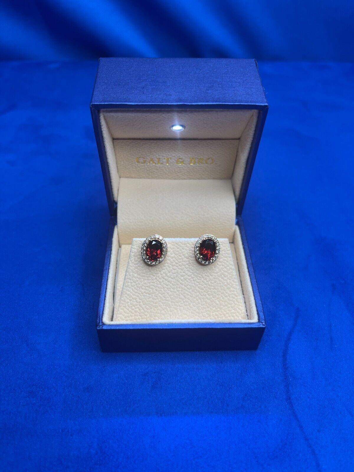 Women's or Men's Oval Red Rhodolite Garnet Diamond Halo 18 Karat Rose Gold Stud Unique Earrings For Sale