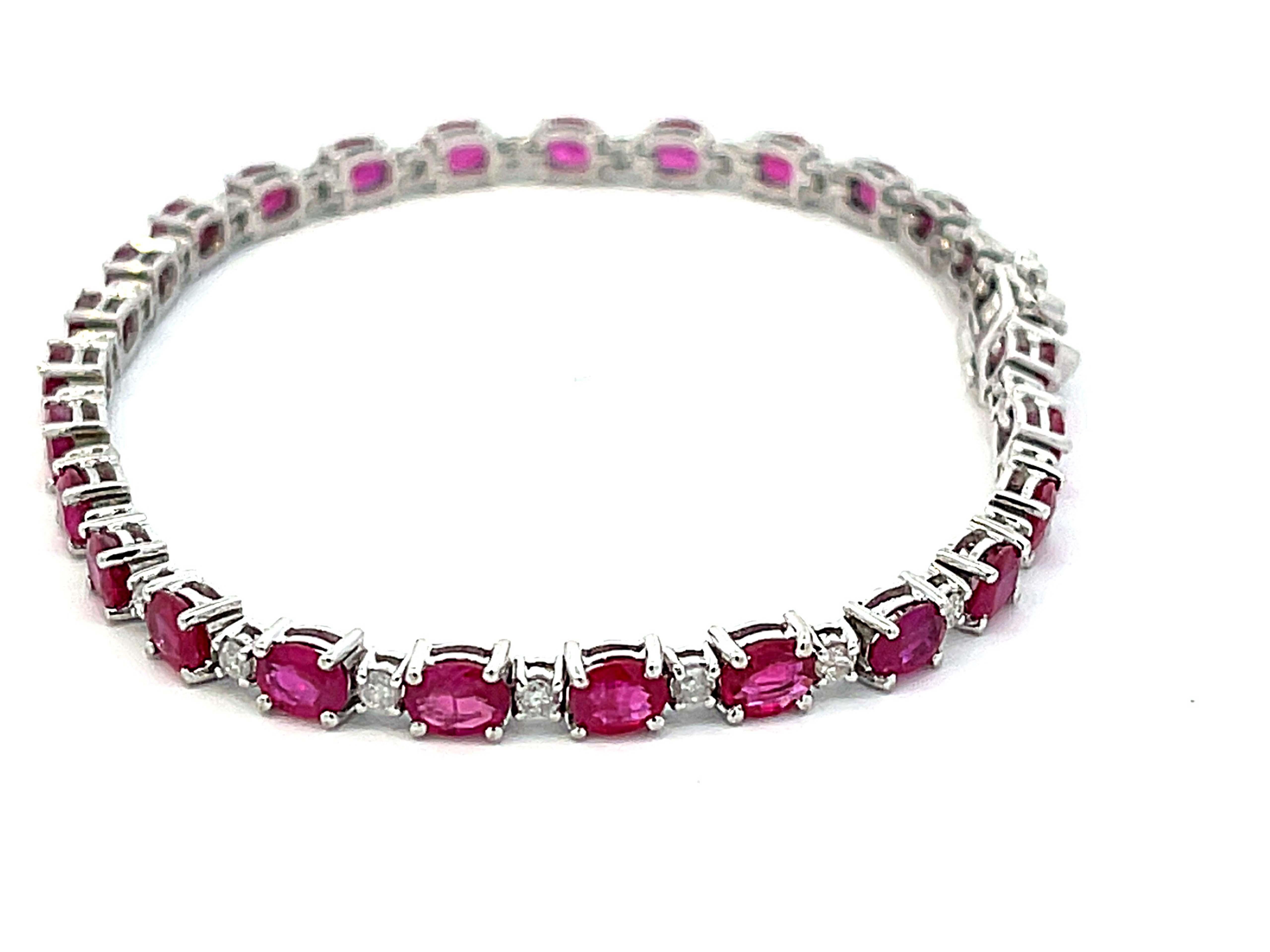 Modern Oval Red Ruby and Diamond Tennis Bracelet in 14k White Gold