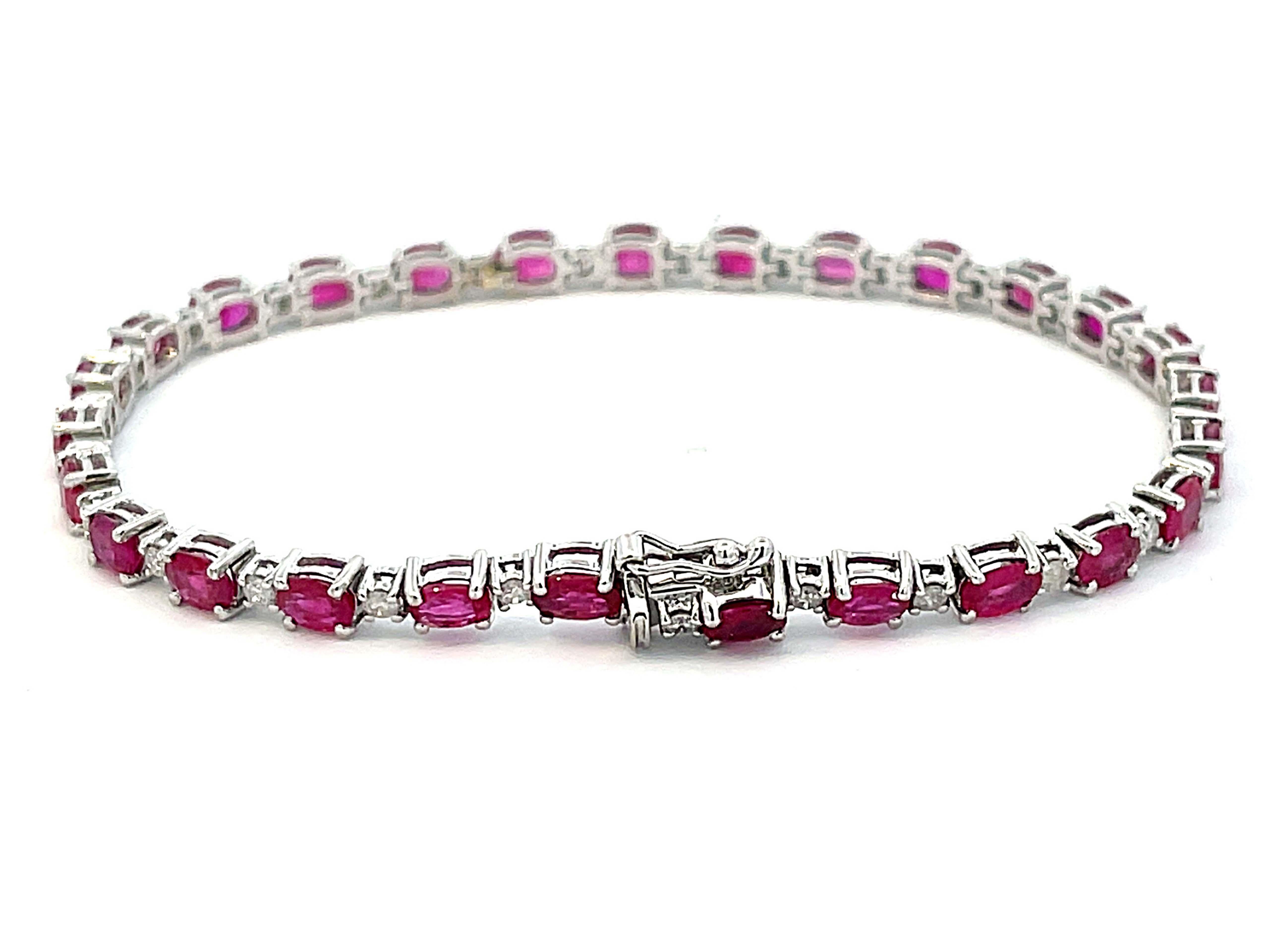 Oval Red Ruby and Diamond Tennis Bracelet in 14k White Gold In Excellent Condition In Honolulu, HI