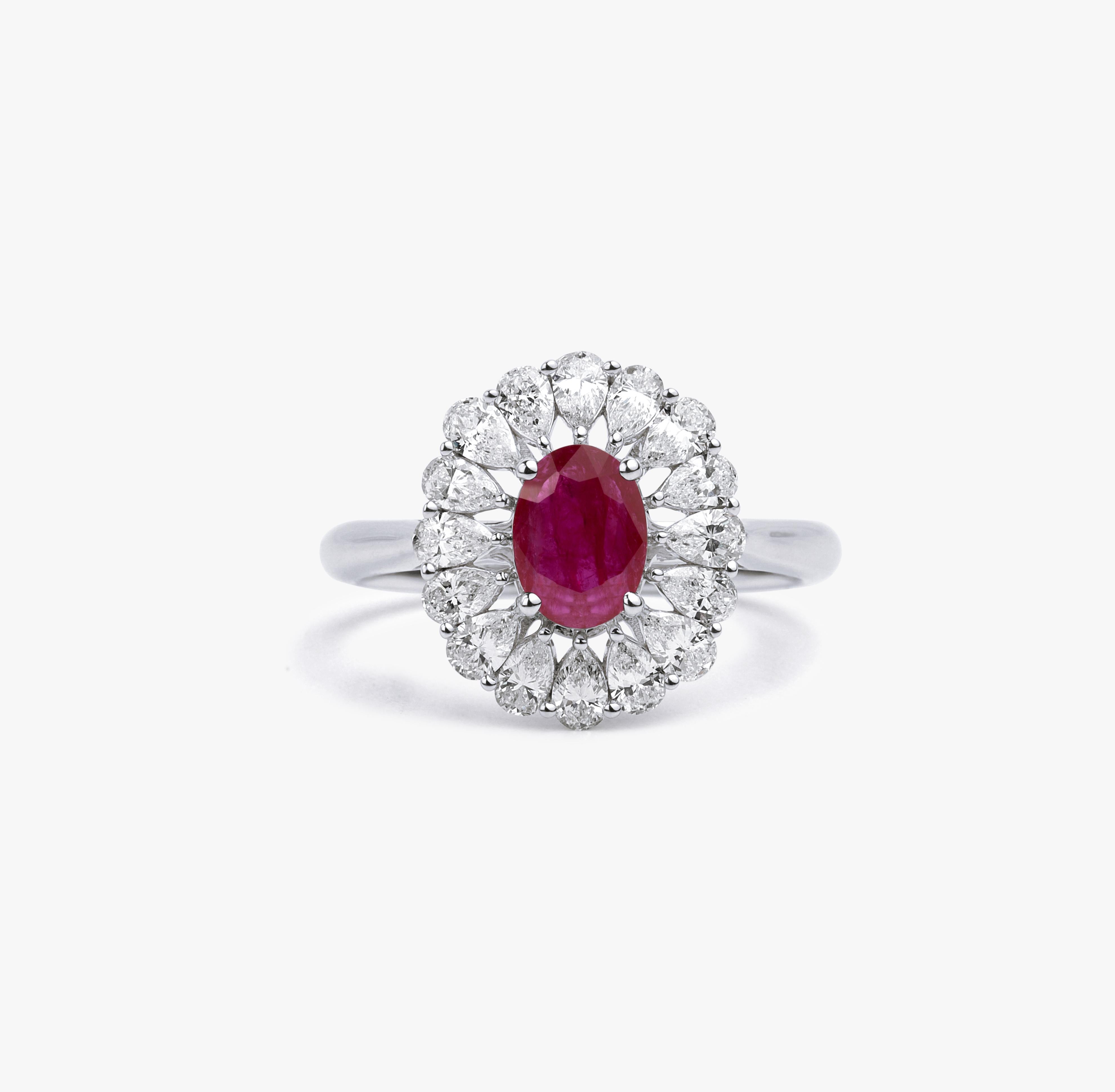 Oval Red Ruby Diamond Pear Cut Halo Cocktail Engagement Ring in White Gold

Available in 18k white gold.

Same design can be made also with other custom gemstones per request.

Product details:

- Solid gold

- Diamond - approx. 1.04 carat

- Ruby -
