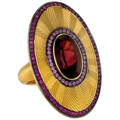 Oval Rhodolite Garnet with Pink Sapphires and Rubies, 18 Karat Yellow Gold Ring