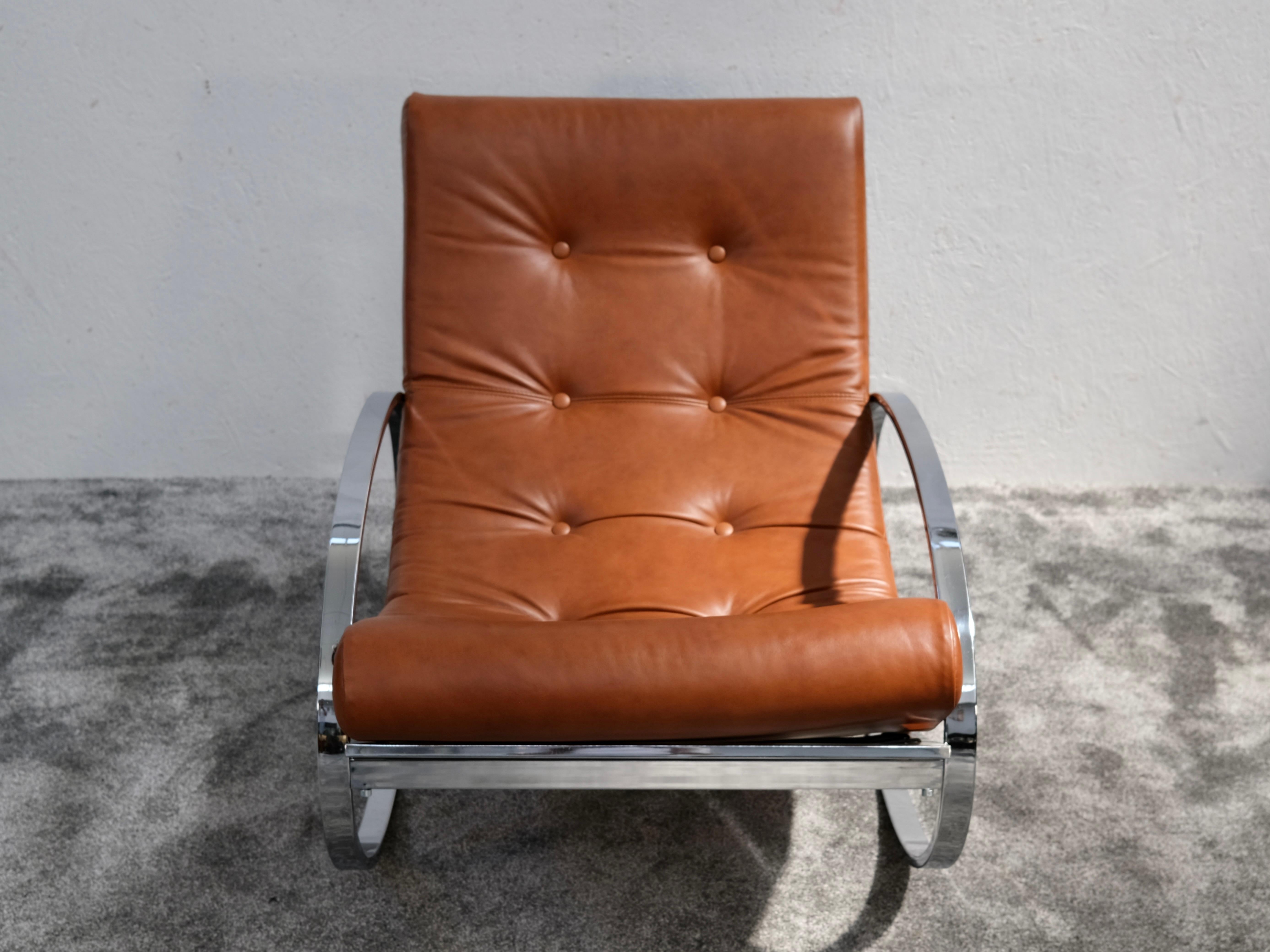 Sedia a dondolo ovale di Renato Zevi per Selig, Italia, anni '70 - Icone della modernità di metà secolo in cromo e pelle

Sedia a dondolo, salotto a dondolo, capolavoro del Mid-Century, metallo cromato: questo pezzo scultoreo vintage è tutto questo