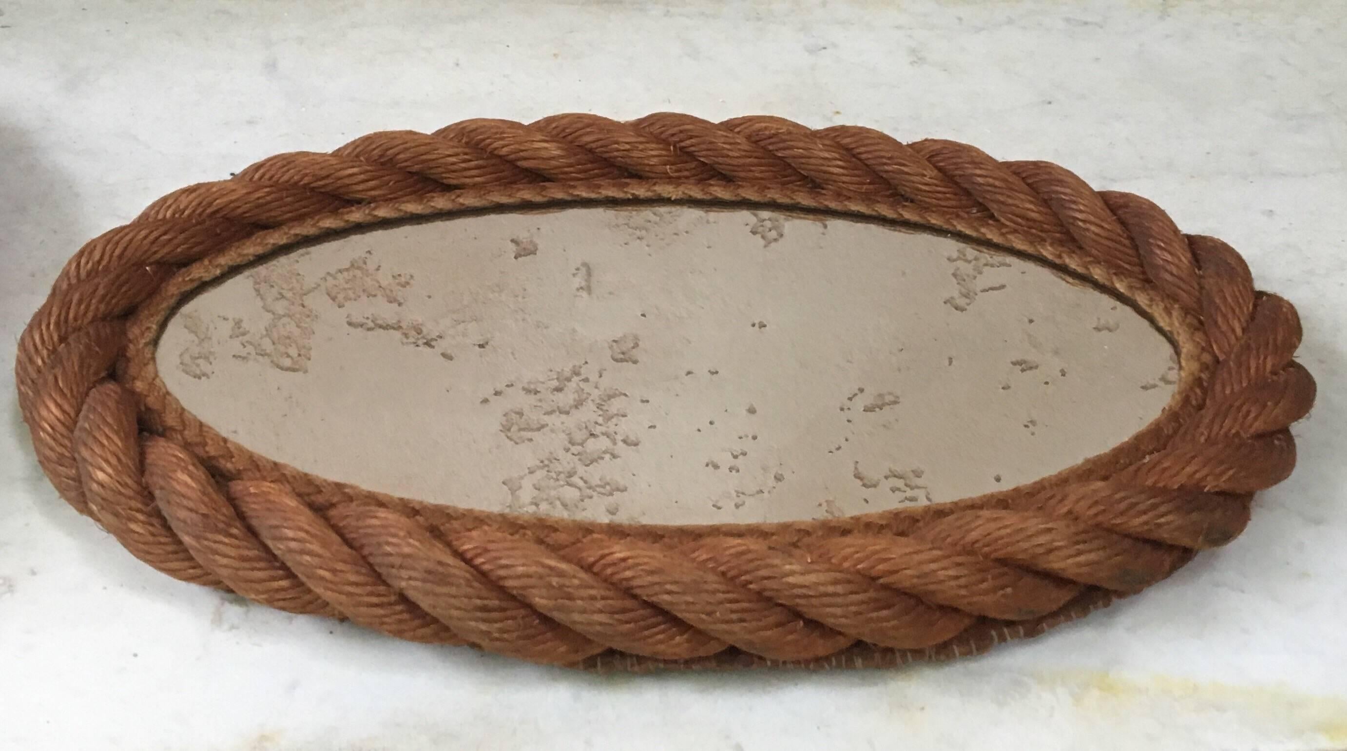 Oval rope mirror Audoux Minet circa 1960 from South of France.