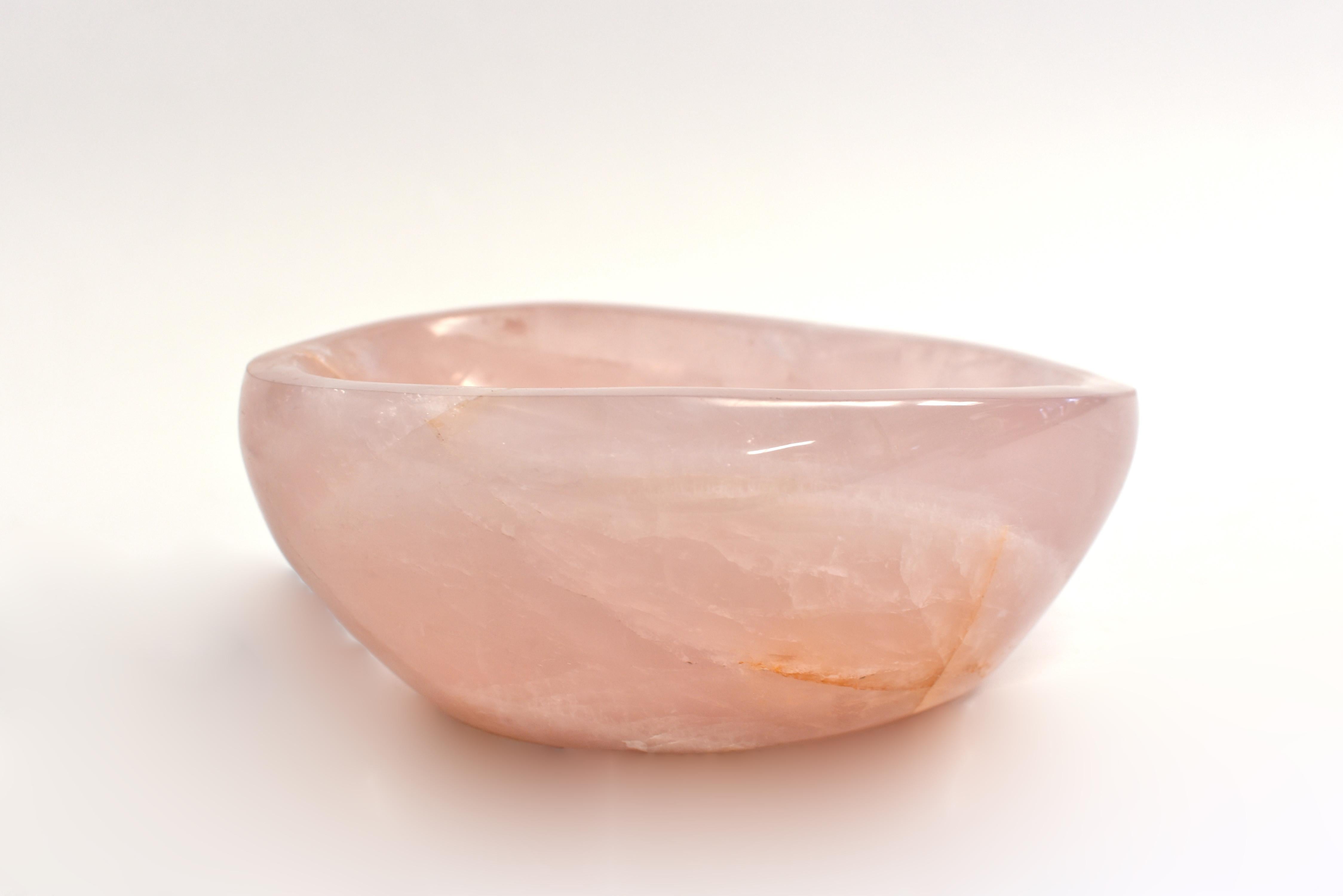 A beautiful large rose quartz bowl weighing 6.15 lbs. Of ovoid form with smooth edge and polished inside out, stone of the highest quality grade AAA rose quartz. All natural gemstone, hand crafted and polished. Stunning color and iridescence. Rose